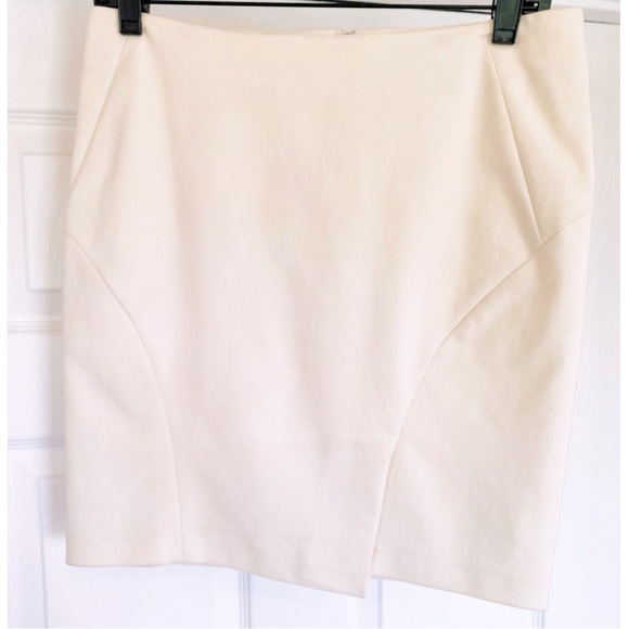 bebe Dresses & Skirts - Used bebe White Cotton Blend Bodycon Asymmetric Mini Skirt in Size 6